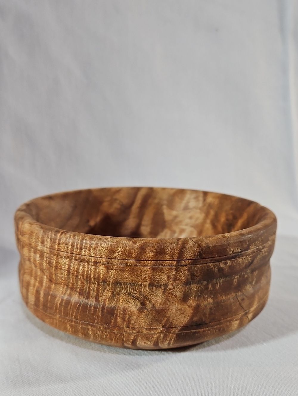 Hand-Turned Rustic Wooden Bowl Featuring a Rich, Swirling Natural Grain